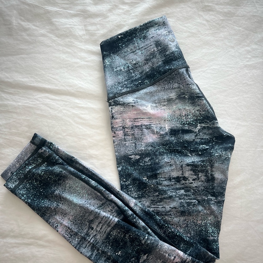 Size 4 LULULEMON Leggings. Never worn